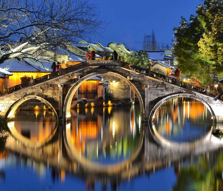 Delve into Wuzhen Water Town: Private Tour from Shanghai - Walking narrow lanes, stone bridges, and cobbled paths