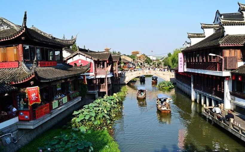 Private Half -Day Tour to Qibao Ancient Water Town - Street markets and snack time: fun, but budget for it