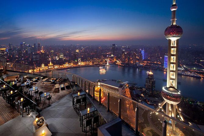 Shanghai Authentic Dinner and Night River Cruise with Rooftop Bar Hopping Option - The authentic restaurant dinner: soup dumplings and real ordering freedom