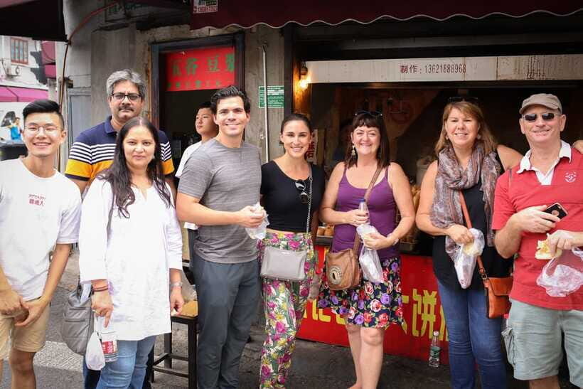 Shanghai Coffee & Breakfast Tour - Bings at a cheerful stall: the perfect snack you’ll crave later