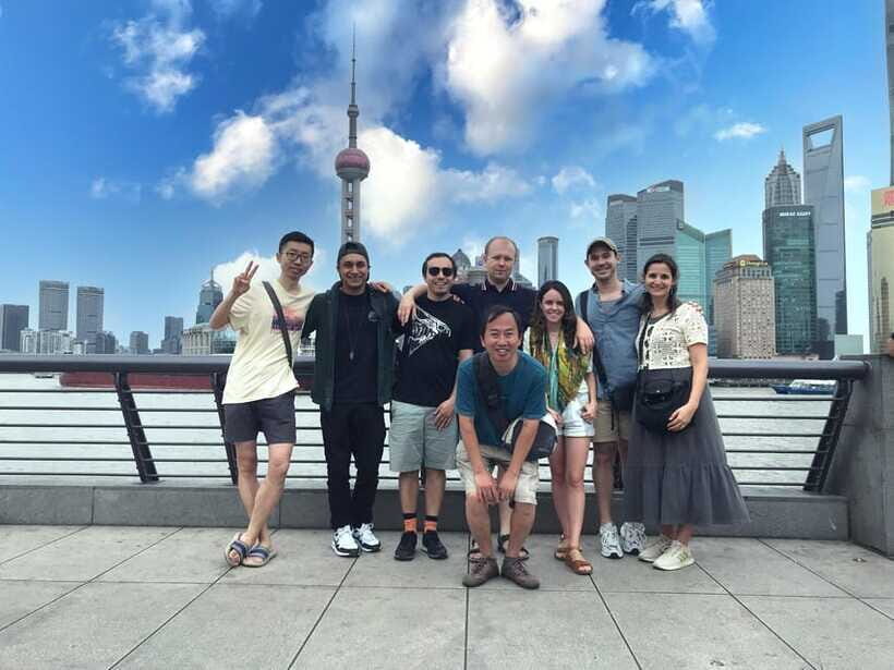 Shanghai Highlights Walking Tour With A Real Local - Nanjing Road on foot: commerce, crowd control, and street-level Shanghai