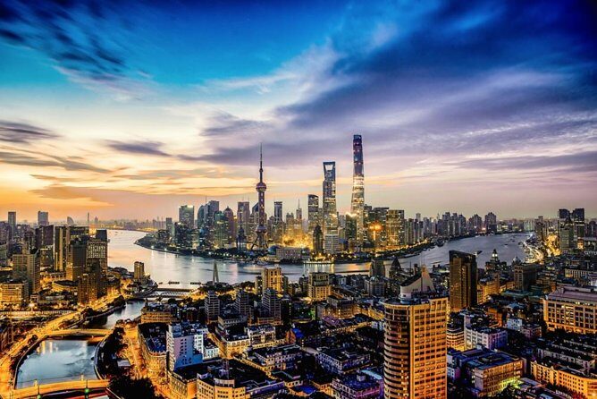 Shanghai Layover featuring a dual experience of Tesla & Maglev - Airport pickup and dim sum timing for a 6- to 8-hour window