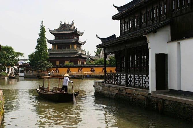 Zhujiajiao Water Town and Shanghai City Highlights Private Day Tour - Zhujiajiao Ancient Town: canals, historic streets, and a boat ride you’ll remember