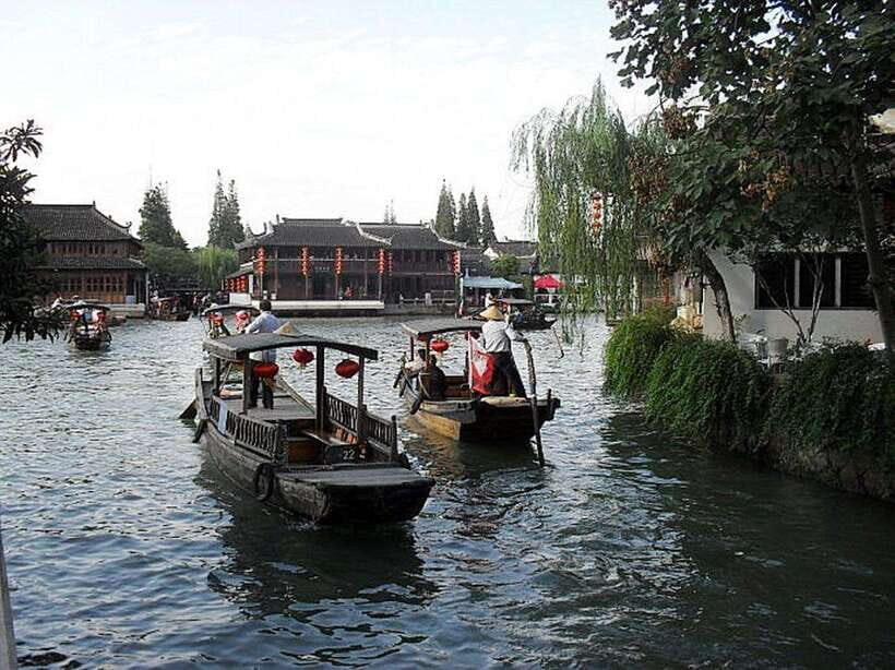 Zhujiajiao Water Town Private Tour with Night River Cruise - Entering Zhujiajiao’s Stone Lanes and Ming-Qing Style Scenery