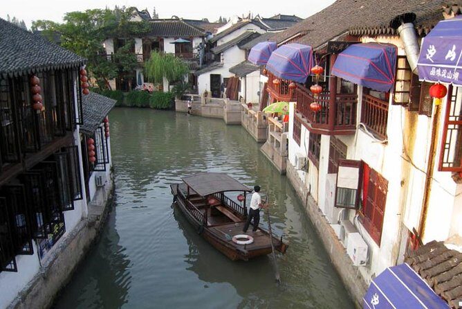 Zhujiajiao Water Village & Seven Treasure Town Day Tour from Shanghai - Zhujiajiao: Ming-and-Qing Bridges, Temples, and the Dianpu River Boat Ride