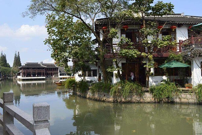 Zhujiajiao Water Village & Seven Treasure Town Day Tour from Shanghai - Qibao / Seven Treasure Town: Textiles, Rice Wine, and a Mill Wedding Hall